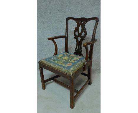 A Georgian mahogany open armchair with drop in tapestry seat on square tapering supports. H.94cm 