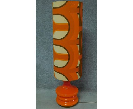 A 1970's vintage table lamp in tangerine glaze and matching tall shade. H.123cm 