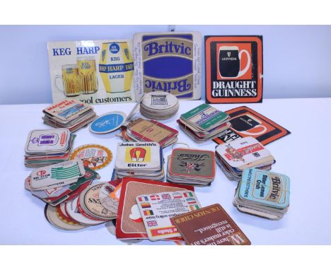 A job lot of over 100 vintage beer mats 