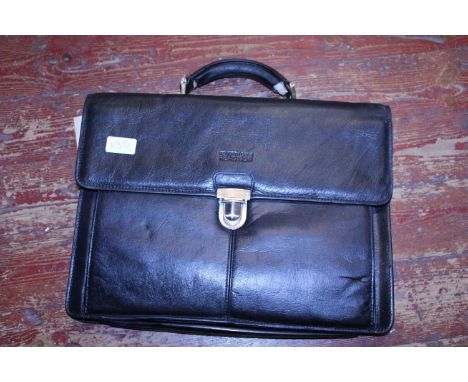A vintage leather attache case 