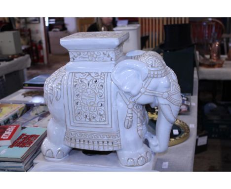 A large ceramic elephant planter stand. Shipping unavailable 