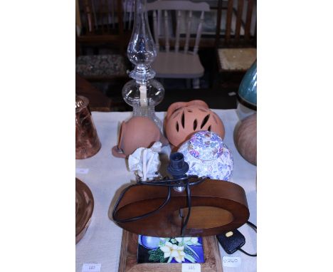 A job lot of assorted collectables including an oil lamp. Shipping unavailable. 
