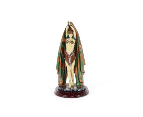 An Art Deco style figurine, depicting a lady with cloak, 32cm high