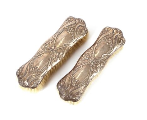 A pair of silver mounted Art Nouveau hair brushes; a vintage AA badge; various plated cutlery; white metalware etc.