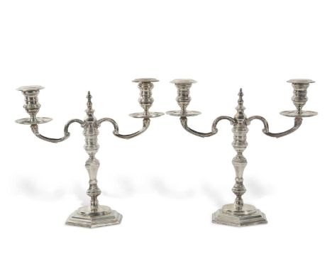 A pair of Irish Sterling Silver cast two light candelabra, Dublin 1973, makers mark for The Royal Irish Silver Company, of he