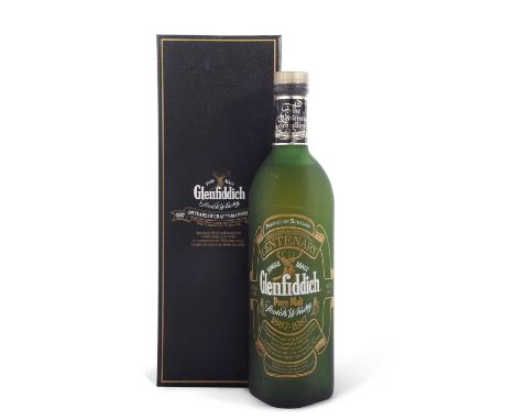 Cased bottle of Glenfiddich Malt Scotch Whisky produced on Christmas Day 1986 on the 100th Anniversary of Glenfiddich, this e
