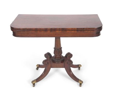 Late Regency mahogany, pedestal fold-top card table on four fluted sabre legs, brass caps and casters 91cm wide