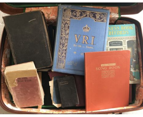 A case of assorted vintage books to include an 1852 family Bible &amp; News Chronicle Song Book. Together with V.R.I. Her lif