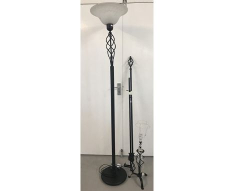 A matching modern black metal uplighter, table lamp and curtain rail with spiral detail. Uplighter on circular base with fros