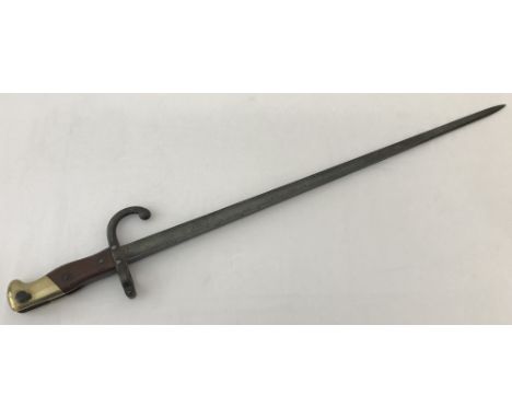 An antique French Gras M1874 T-section bayonet with engraved blade, dated 1878. Hooked quillion stamped and marked L93074. Bl