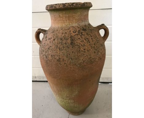 A large vintage terracotta 2-handled garden urn.