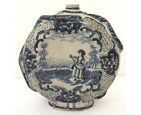 A vintage continental terracotta circular water bottle with blue and white painted classical scene. Applied serpent detail to