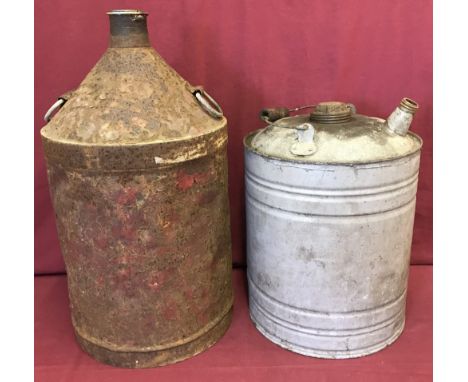 Two large vintage galvanized oil cans with handles to top.