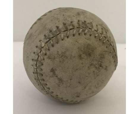 A vintage American white leather baseball.