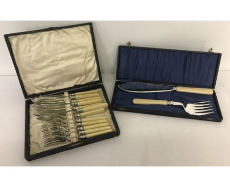 A set of vintage silver plated fish knives &amp; forks and separate serving set.Knives &amp; forks are silver mounted, hallma