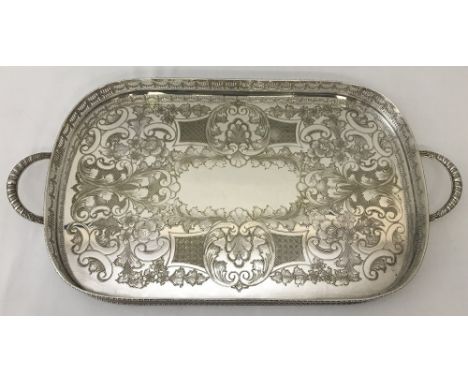 A vintage Viners "Chased" alpha silver plated 2 handled tray with floral swag detail. Rectangular tray with curved corners an