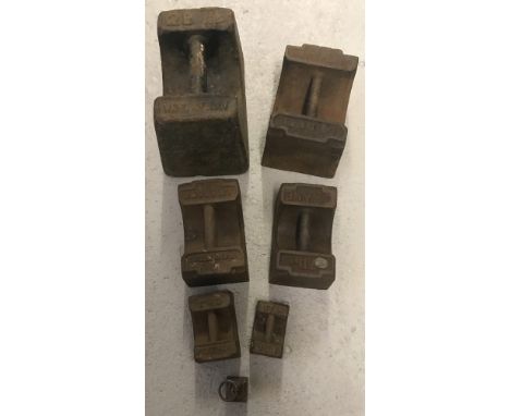 Seven vintage square weights. Ranging from 1/4lb to 28lb.