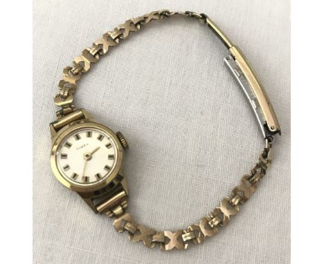 A modern Times vintage winding ladies watch with a vintage rolled gold strap.