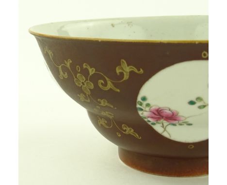 A Chinese porcelain bowl, hand painted floral panels on brown and gilt ground, seal mark under, diameter 19cm.