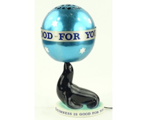 A Carltonware Guinness Is Good For You seal design advertising table lamp, with original revolving metal shade, height 37cm.