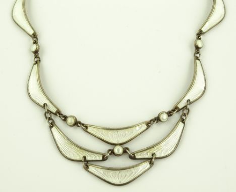 A Scandinavian silver and white enamel tiered necklace, circa 1970s, makers marks A.Sch.