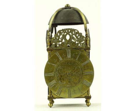 An Antique brass cased lantern clock, engraved brass dial signed Thomas Barrett of Lewes, pierced and engraved pediment strik