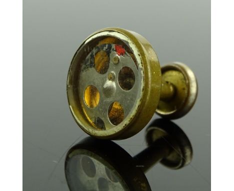 A rare Second War period SOE Agent escape compass, designed to be worn as a dress stud, originally having a painted over glas