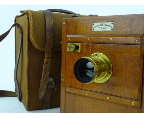 A 19th century Optimus half plate camera by Perken Son & Rayment, Hatton Garden, London, original canvas case, recently servi