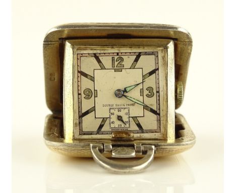 A 1930/40s silver gilt travelling clock, with subsidiary seconds dial and luminous hands, dial marked double shock proof, cas