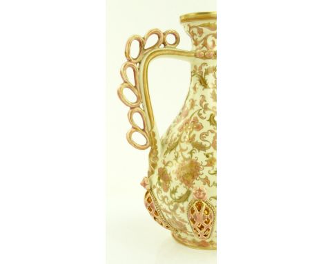 A Zsolnay Pecs painted and gilded ewer with reticulated panels, height 29cm.