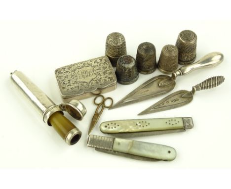 Box containing trowel design bookmarks, thimbles, fruit knives, pillbox, etc.