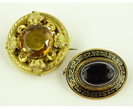 A banded agate black enamel and gilt metal Memorial brooch, and another brooch set with a citrine, (2).