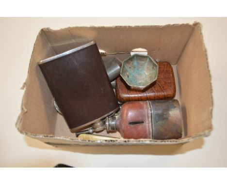 A box containing hip flasks, silver plated mustard pot, button hook etc.