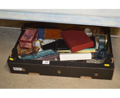 A box of various sundries to include a corkscrew, china ornaments, a mantel clock etc. 