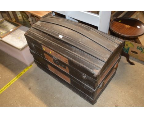 A metal and wooden bound trunk 
