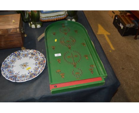A bagatelle board 