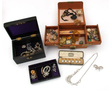 A quantity of assorted costume jewellery to include a set of six mother of pearl and enamel dress studs, cased, in two jewell