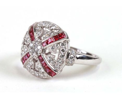 An 18ct white gold Art Deco style ruby and diamond cluster ring, approx UK size 'O'.