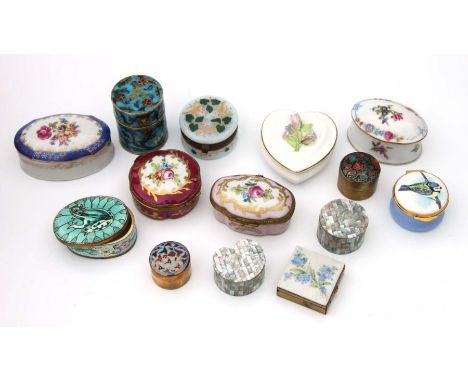 A group of pill and trinket boxes to include Kaiserware, Coalport and enamel examples.