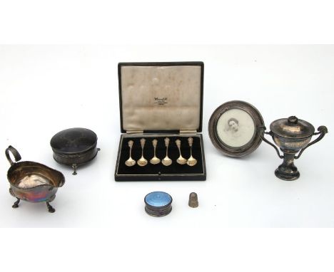 A set of silver coffee spoons; together with a silver and tortoiseshell dressing table box; a silver and guilloche enamel pil