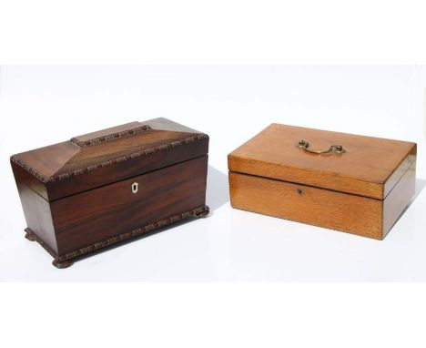 A 19th century rosewood tea caddy of sarcophagus form, on bun feet, 34cms wide; together with an oak box with brass carrying 