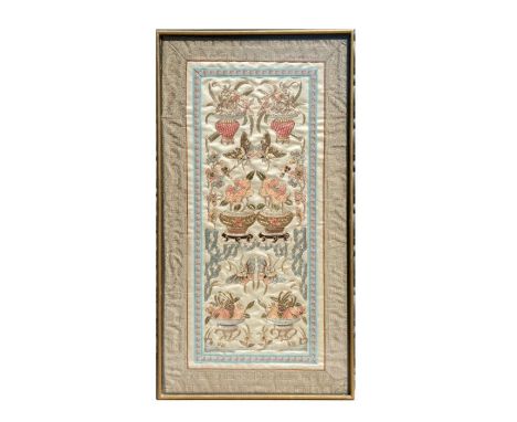 A Chinese silkwork embroidered panel depicting butterflies and flowers in vases, framed, 33 by 63cms.