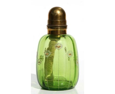A Victorian style green glass and brass opium lamp with enamel floral decoration, 15cms high.