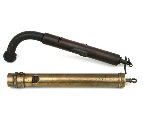 A brass steam engine whistle 'Nightingale M &amp; B No 307258', 36cms long; together with another similar, 27cms long (2).