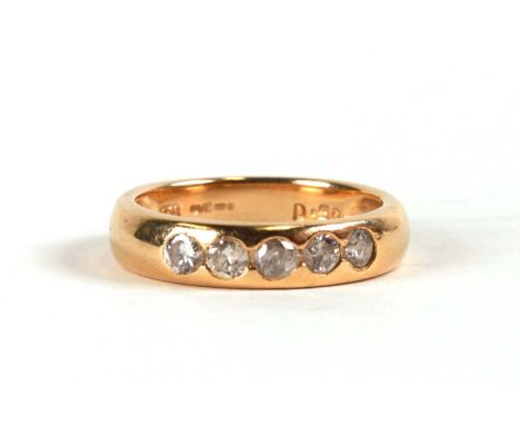 An 18ct gold and five-stone diamond gypsy style ring, weight 4.4g, approx UK size 'M'.