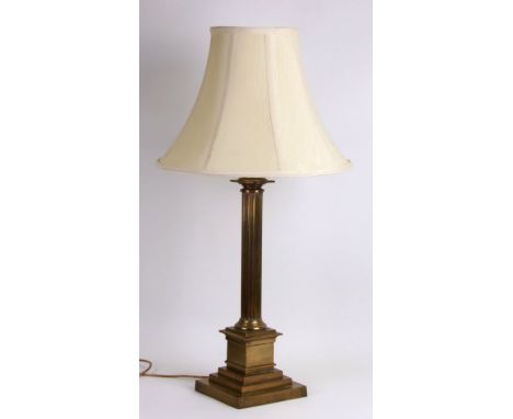 A brass Corinthian column table lamp, 53cms high.
