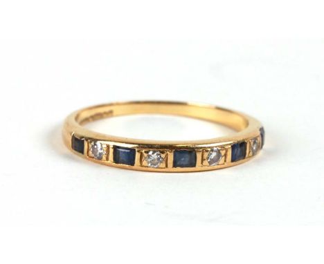 An 18ct gold diamond and sapphire half hoop ring, approx UK size 'M'.