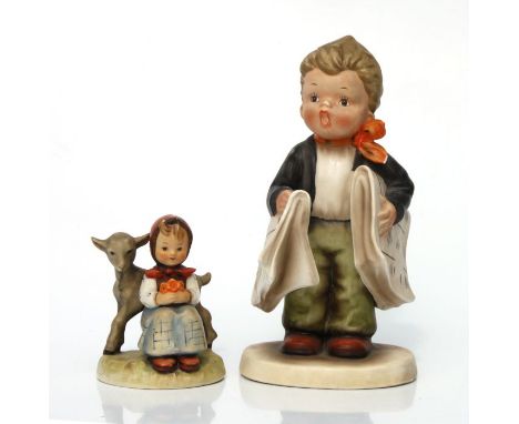 A Goebel group depicting a young girl with a lamb, 9cms high; together with another similar larger of a young boy with the Ne