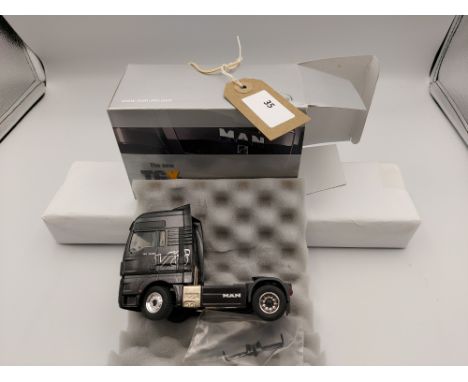 Manufacturer  - Conrad | Description - MAN TGX | Stock Code - 70000/0 | Notes - Good - Box slight wear| Scale - 1:50 | Certif