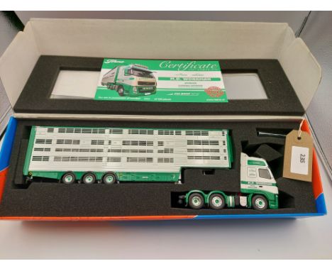 Manufacturer  - Tekno | Description - Volvo FH03 Globetrotter XL & Livestock Trailer - M D Workman | Stock Code - 65248 | Not